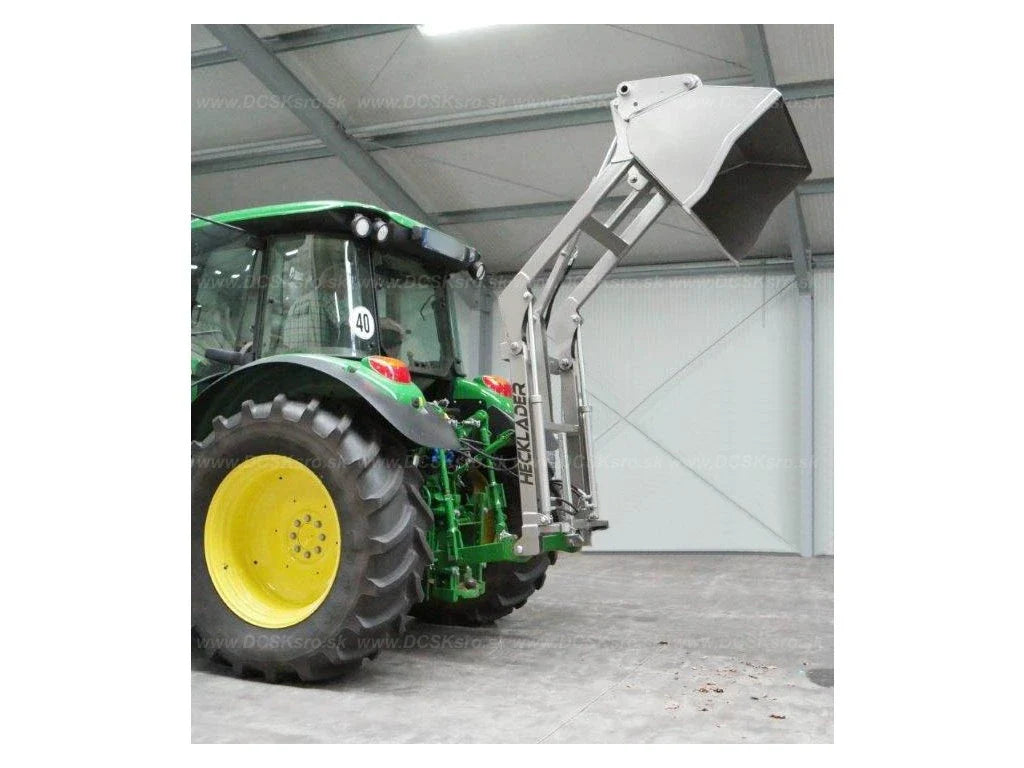 a tractor with the jansen HL-3000 on the rear