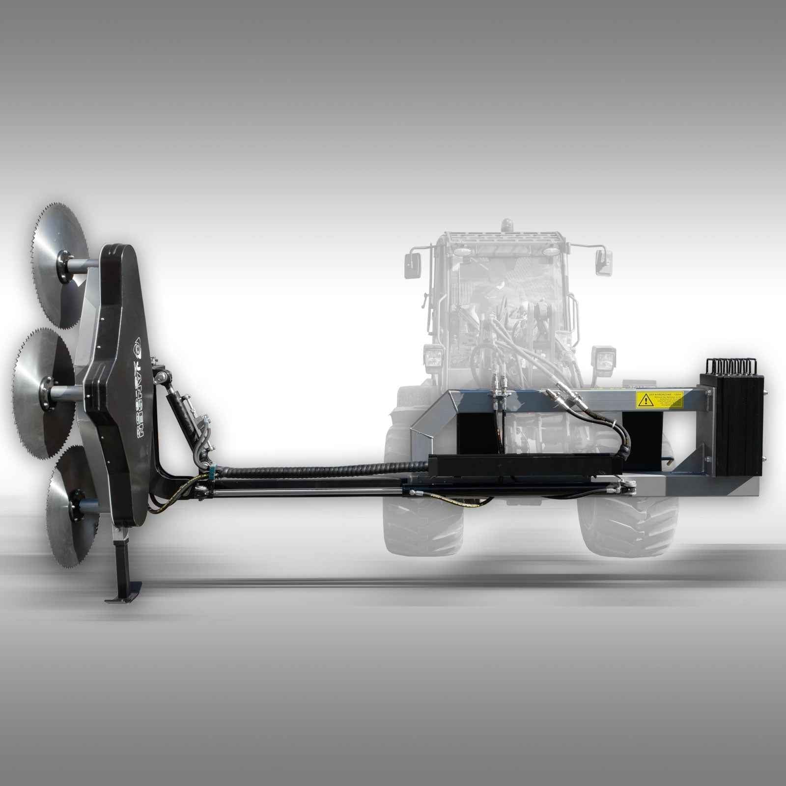 a branch saw attached to a tractor Jansen AS-600